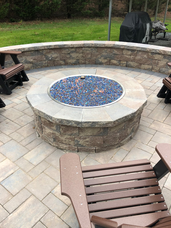 Custom built wood or gas burning firepits in the Greater Charlotte area.