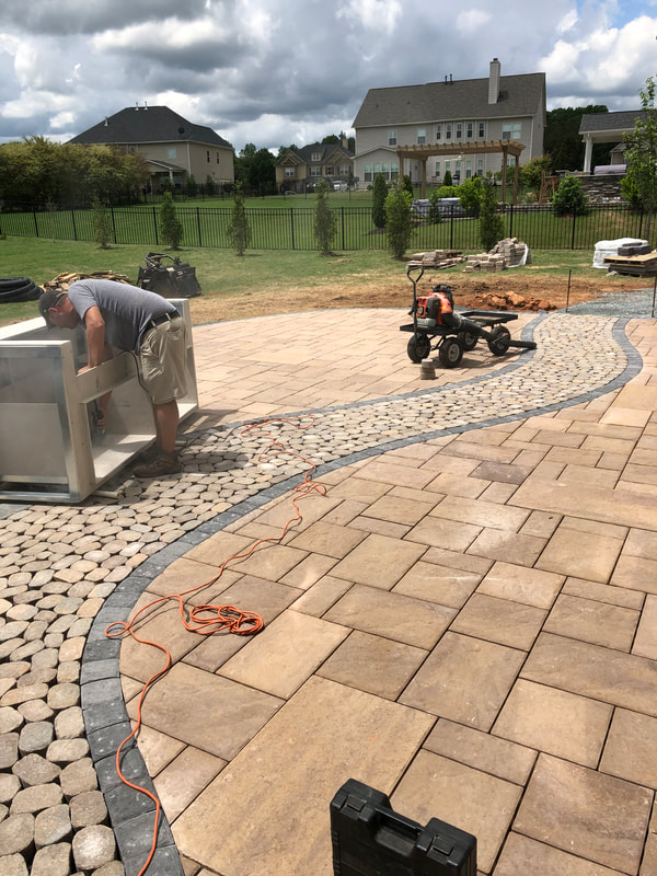 Waxhaw paver patio design and installation.
